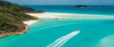 Aerial view of boat on the water near Whitsunday islands